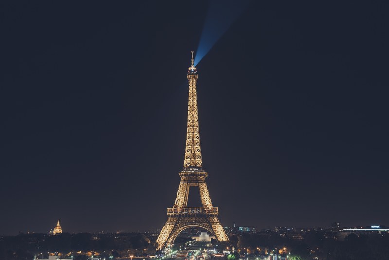 the landmark eiffel tower and its architecture illuminated at night, eiffel tower at night 4k