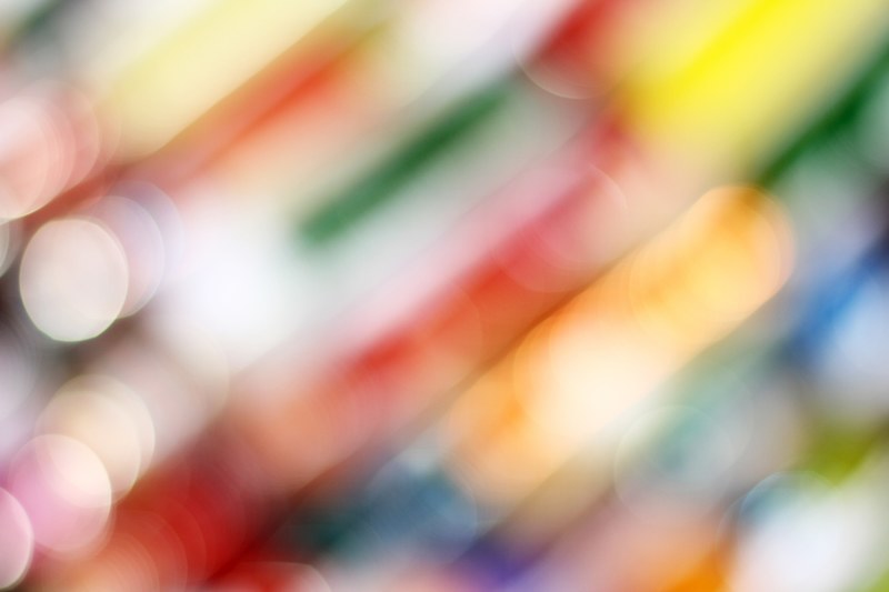 colorful out of focus blurry picture of pencil crayons at arts faculty, colors in bokeh 4k