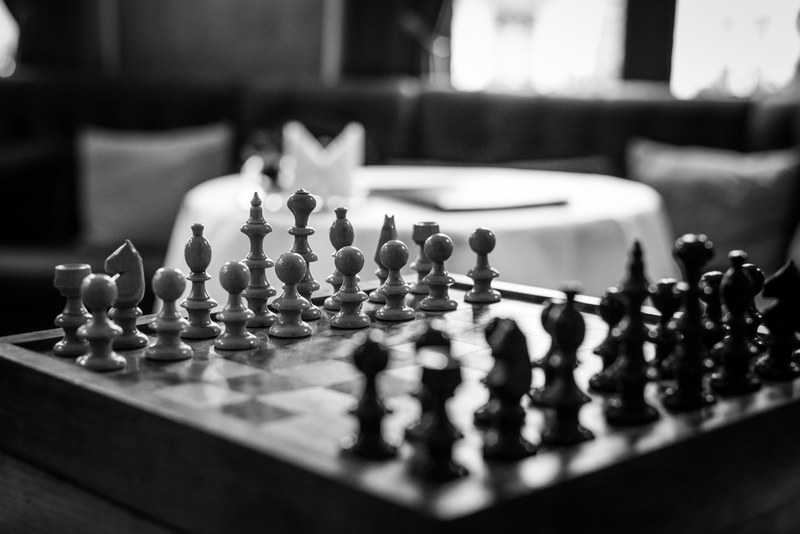 a black and white photo of a chess board, _black white chess game 4k