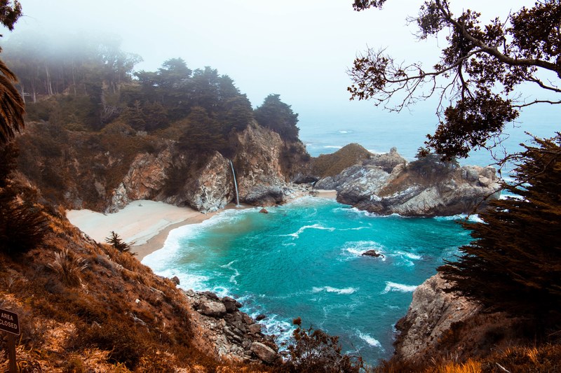 ocean bay between cliffs in julia pfeiffer burns state park, pacific paradise 4k