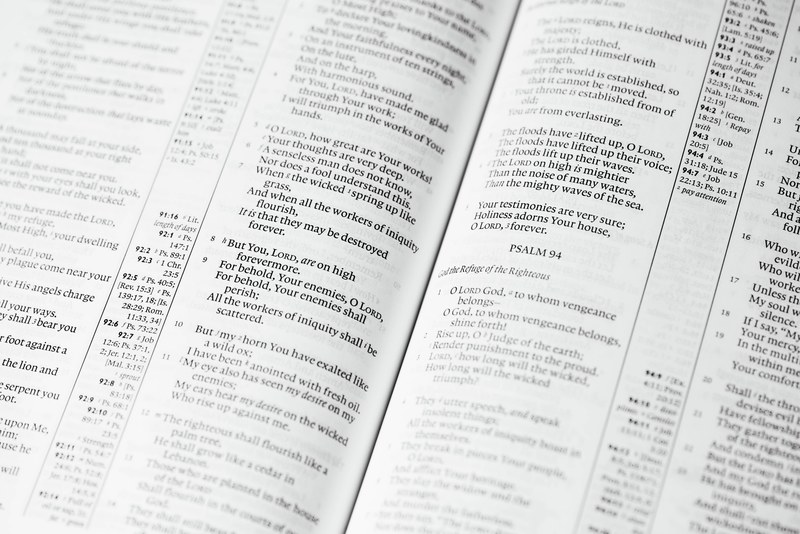 black and white close up shot of verses in religious book, verses in religious book 4k