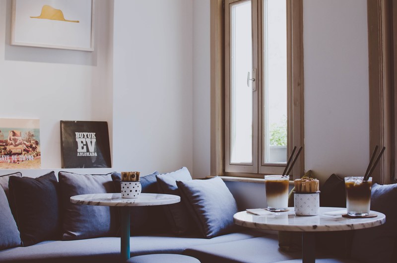tables and cushions in a cafe interior in istanbul, latte couple 4k
