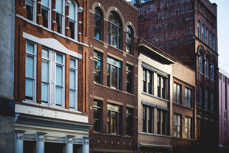 a row of old brick buildings in nashville, _brick buildings nashville 4k