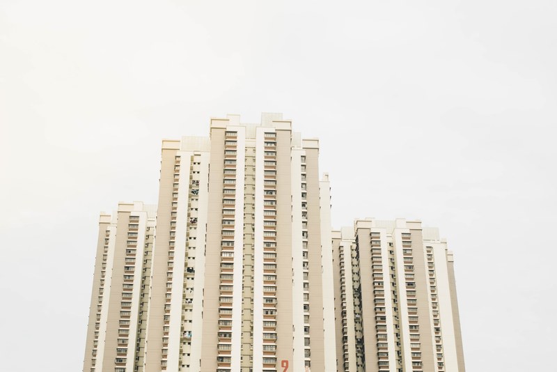 tall tower blocks in a residential complex on a cloudy day, tower block complex 4k