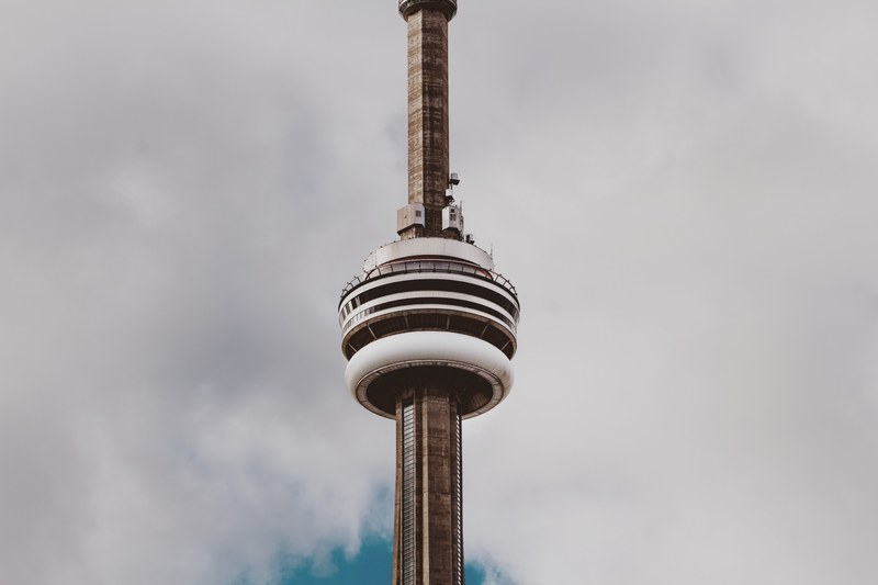 toronto control tower in front of clouds, toronto tower with clouds 4k