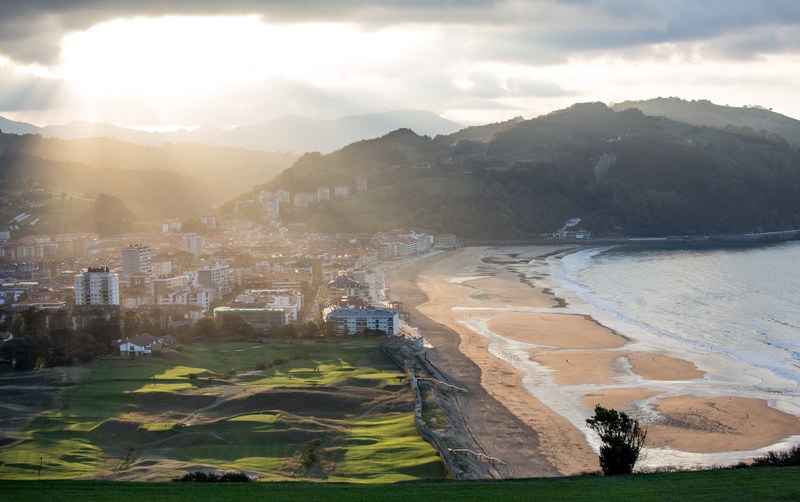aerial view featuring beach settlements and surrounding landscape of the mountains in countryside zarautz, zarautz beach featuring mountain 4k