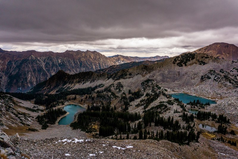 beautiful drone mountain lake and forest views in little cottonwood, desolate lakes 4k