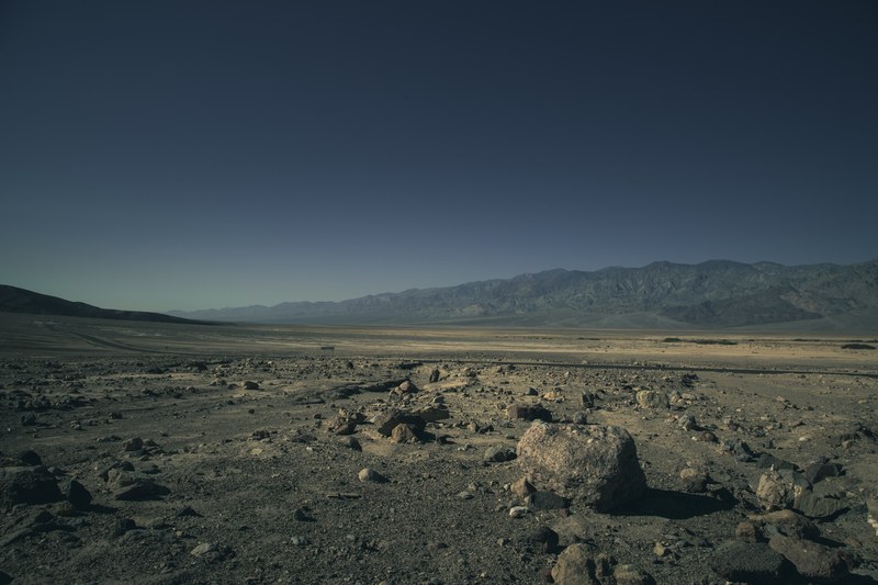 dark skies over a desolate rocky desert, dark skies in death valley 4k
