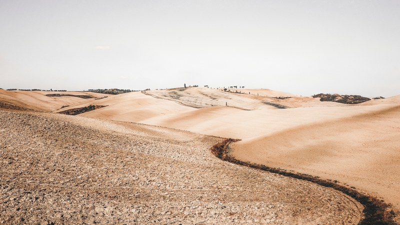 dry soil and sandy desert landscape in val dorcia, dry and desolate 4k