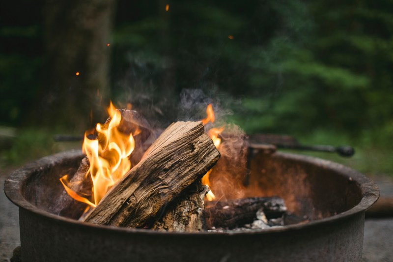 close up of burning firewood in a black caldron, burning firewood 4k