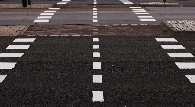 crosswalk pavement road and road paint 4k