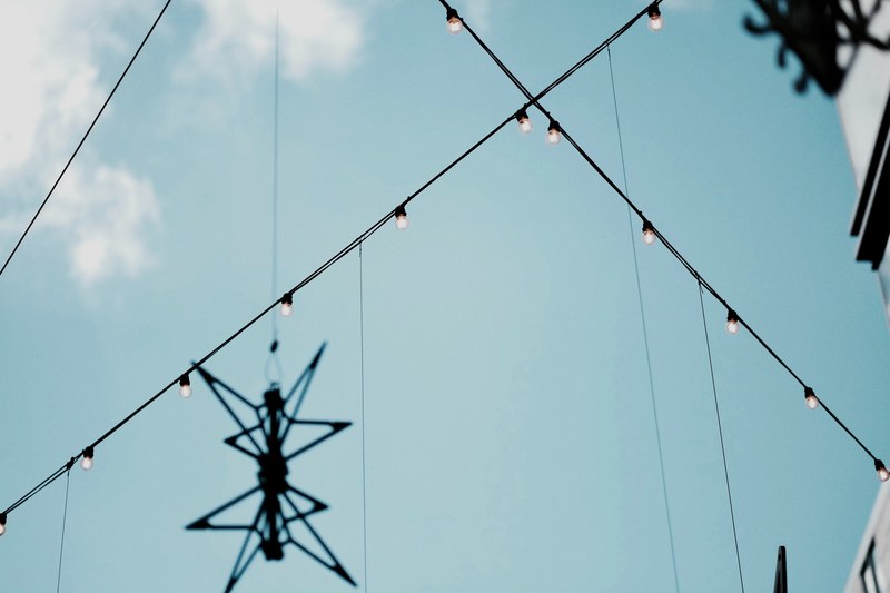 an electric power line with wires hanging in the sky at city center in dc, simple and sweet 4k
