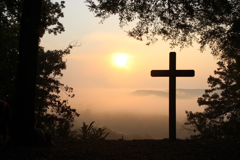 a silhouette of a cross in front of a sunset, _cross silhouette nice sunset 4k