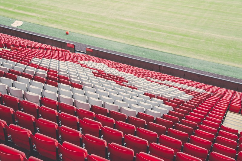 top view of the part of anfield soccer stadium stand with red seats, liverpool football stadium 4k