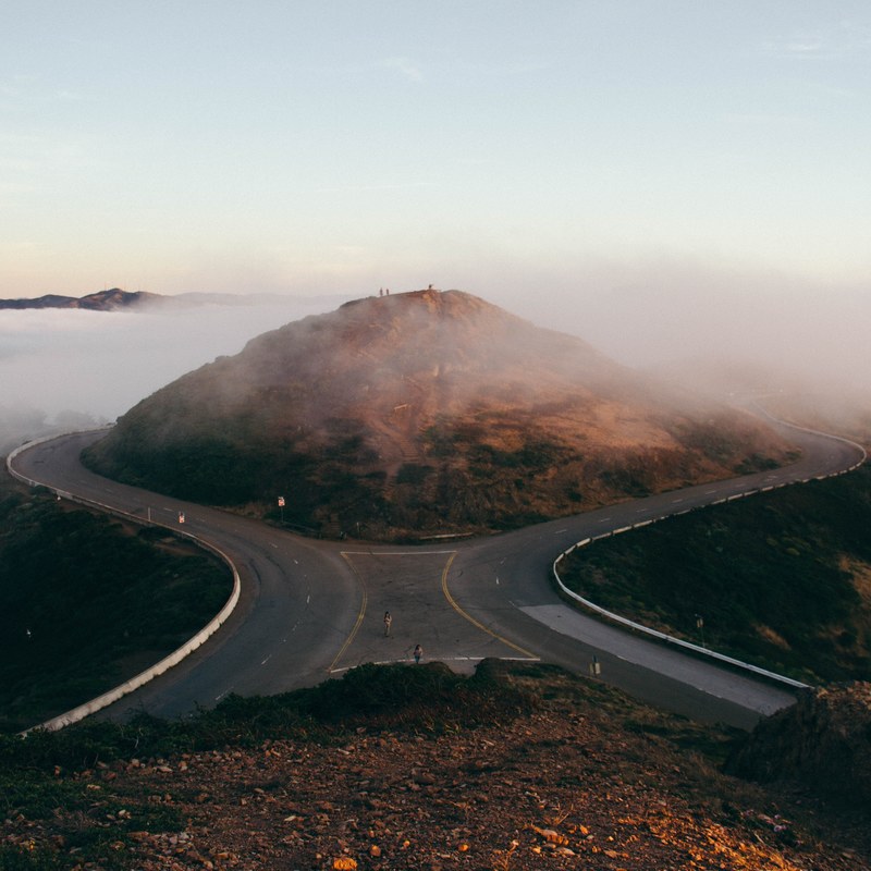 empty roads circle around a mountain, drive around the mountain 4k