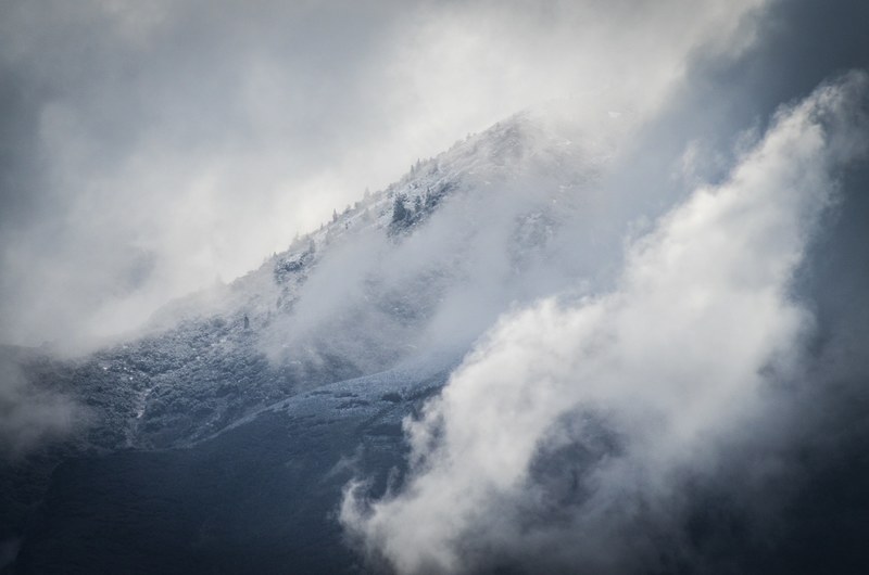 fog rolls in over snowy mountains during winter in lone peak parkway, mountains and clouds 4k