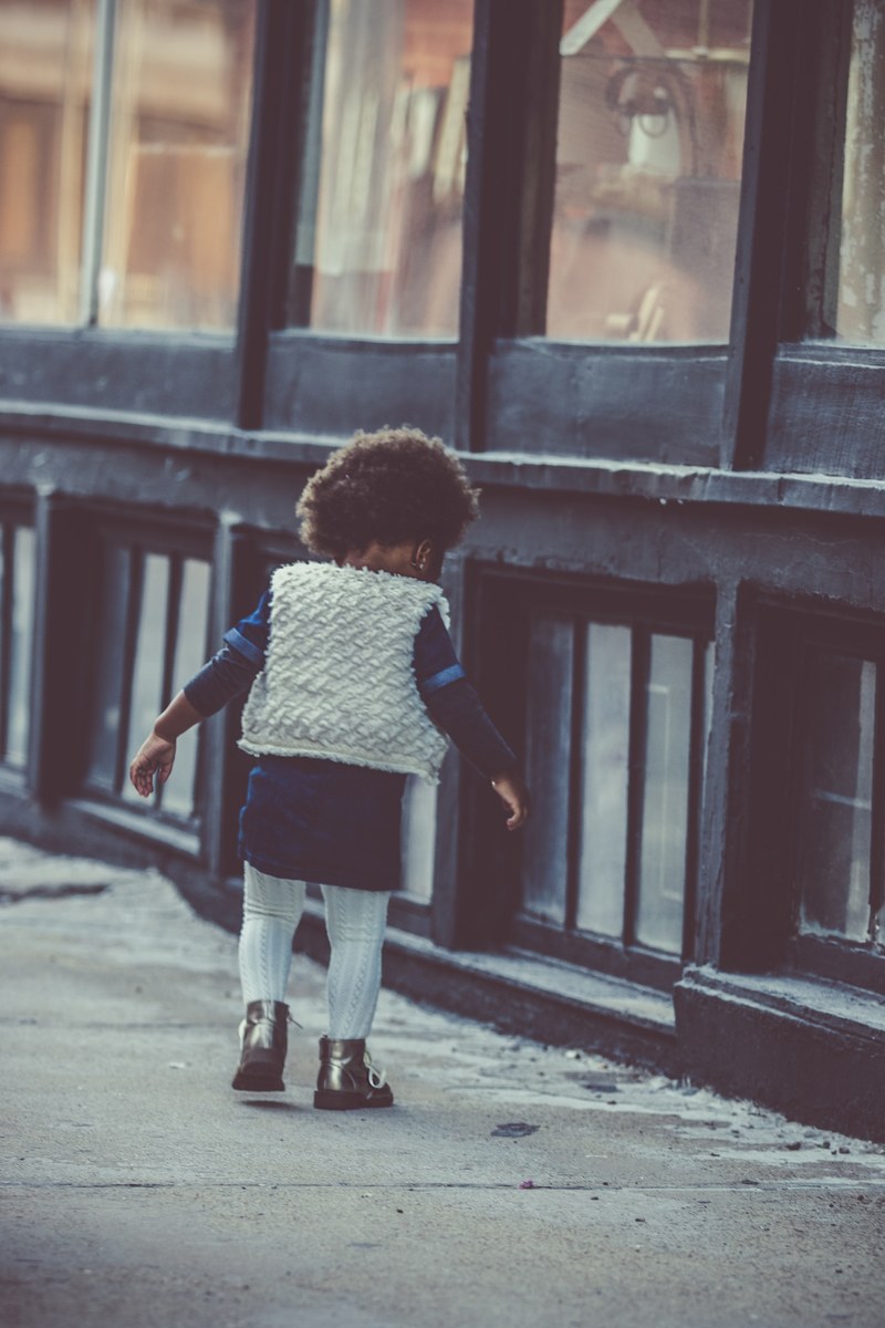 a kid walking down the street, _kid walking street 4k