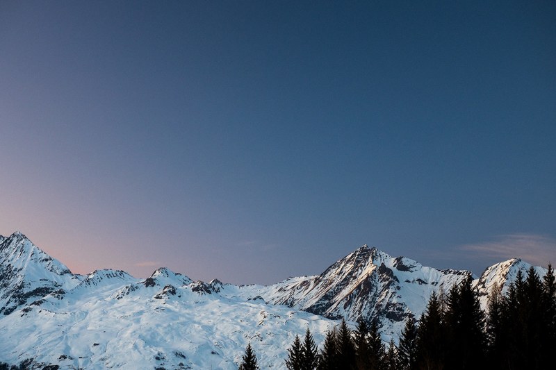 an ice blue mountain ridge with prominent peaks, ice blue mountains 4k