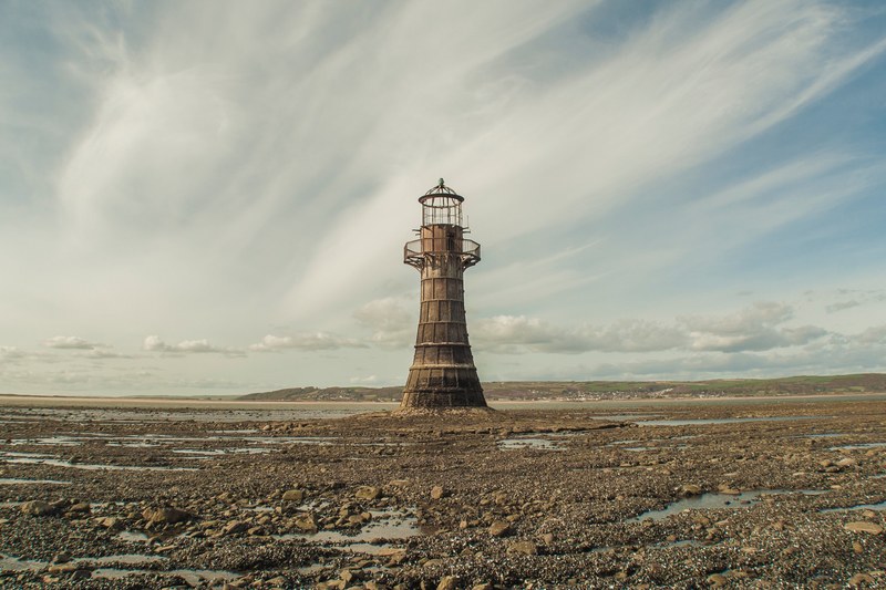 old abandoned lighthouse on the rocky coast at llanmadoc, the whiteford lighthouse 4k