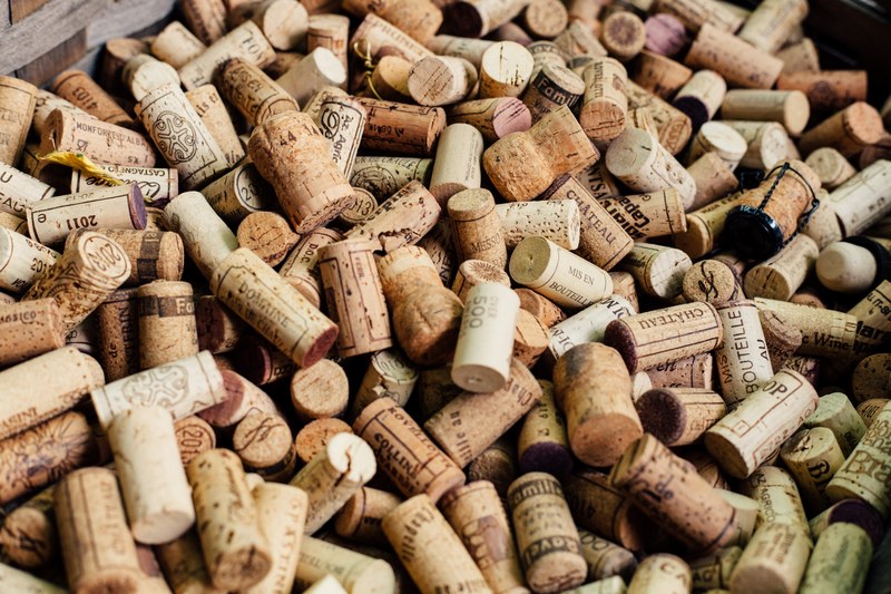 a large collection of wine corks, _wine corks in a basket 4k