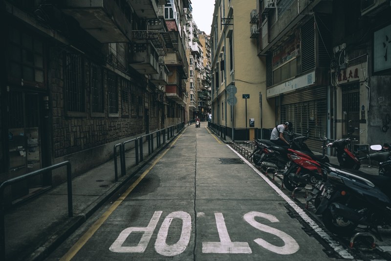 street traffic sign sidewalk and motorcycle 4k