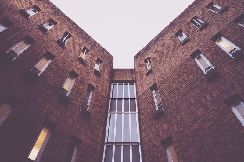 architectural detail of a corner where two wings of a building meet, two wings meet 4k