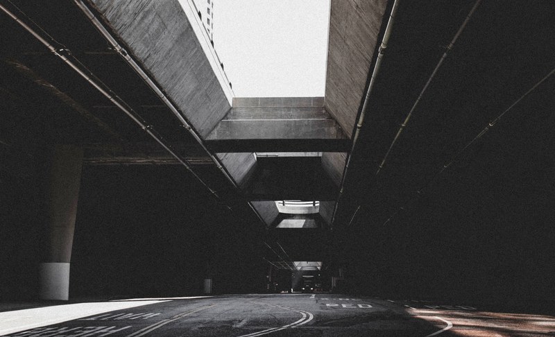 an empty underpass in a city, gloomy underpass 4k