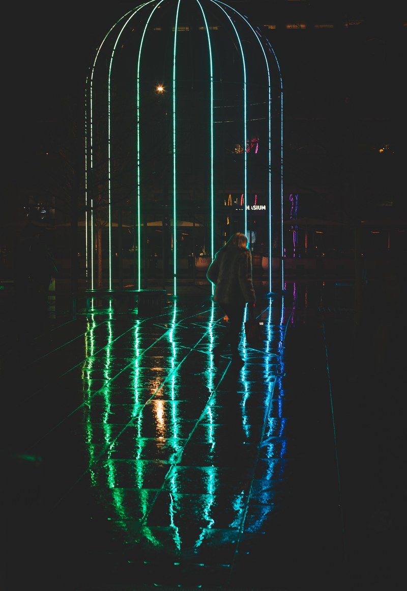 neon light lines at kings cross railroad station in london, bars of light 4k