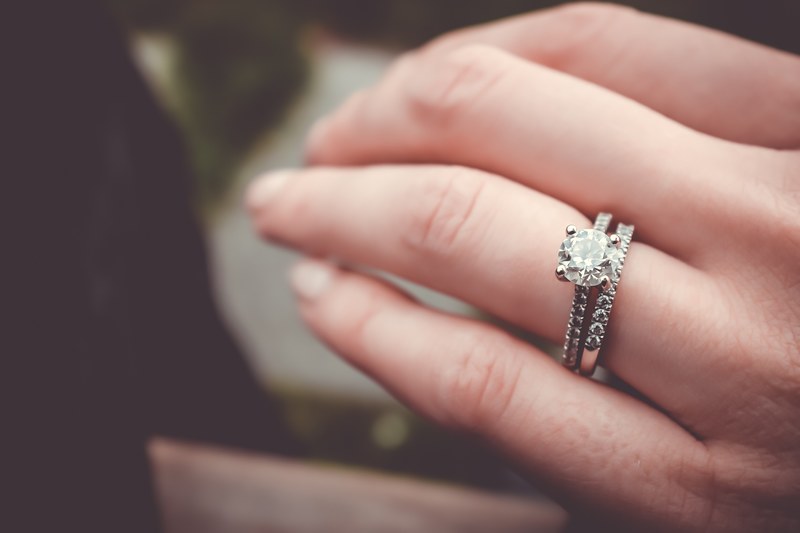 large engagement ring on hand of bride in vancouver, engagement ring on vancouver bride 4k