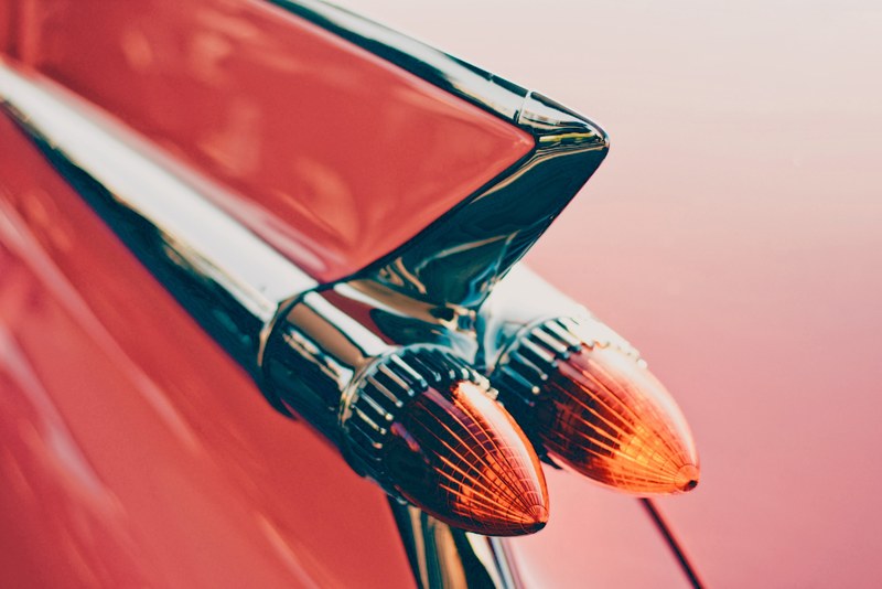 close up of a glossy part of a red car body, glossy red car body 4k