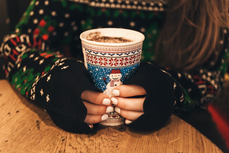 a long haired woman with white painted nails holding a cup of hot chocolate, _holding hot chocolate 4k