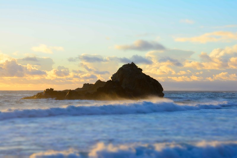 waves around the ocean rock during sunset at pfeiffer beach, ocean rock 4k