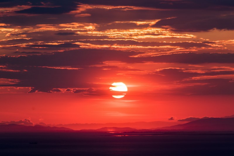 a sunset shot through broken cloud turning the sky red, my beautiful hometown sunset 4k