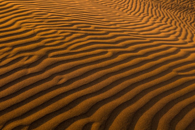 wind rippled sand at pismo beach, endless trails 4k