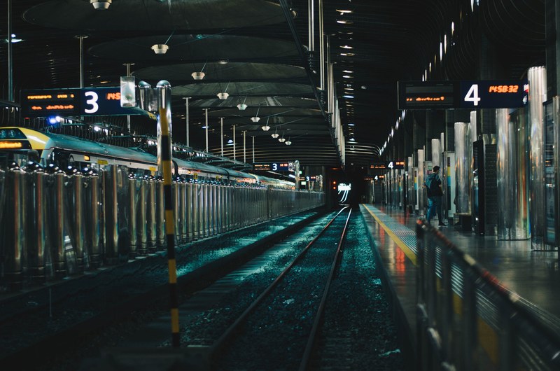 an empty platform at a railway station in auckland, underground rail auckland 4k
