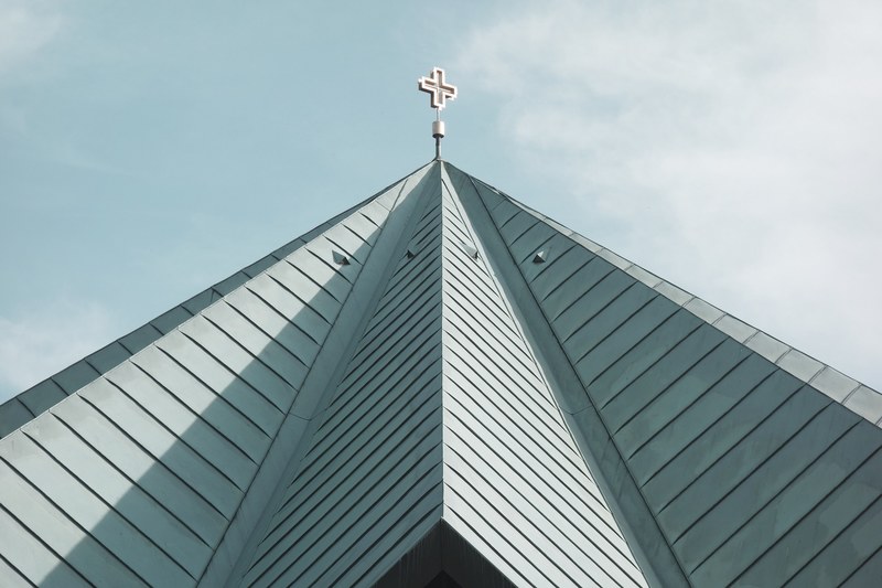a cross on top of a church steeple in erlangen germany, st heinrich kirche_ erlangen germany 4k