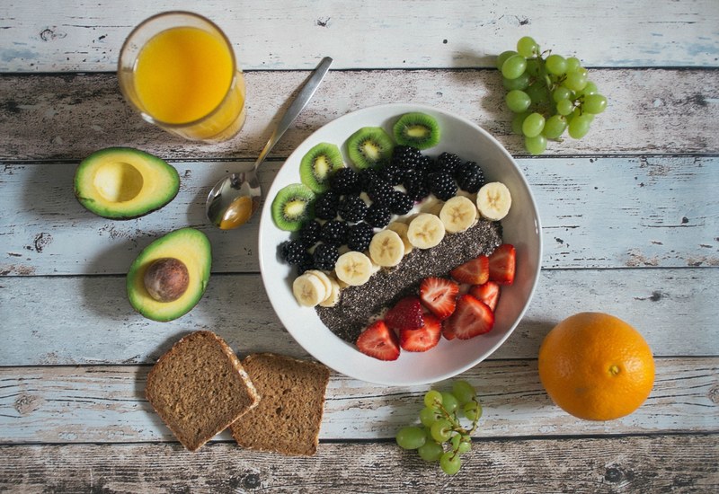 trendy smoothie bowl with fresh fruit avocado chia seeds and berries, healthy trendy brunch 4k