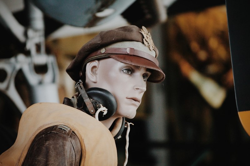 creepy mannequin posed in a vintage pilot outfit, pilot mannequin 4k