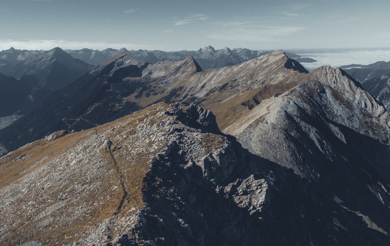a mountainous landscape with sharp ridges and mossy slopes, sunday mountains 4k