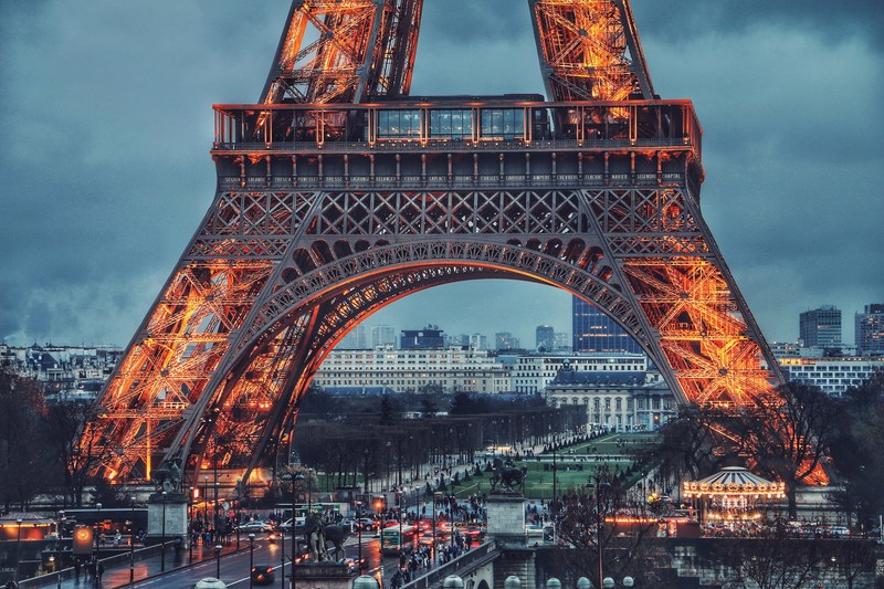 the landmark eiffel tower in paris france illuminated at night, _yellowish eiffel 4k