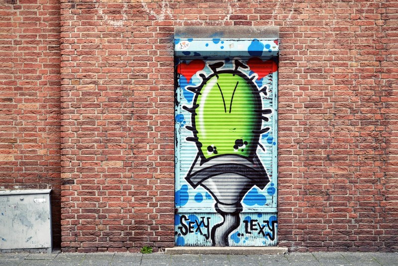 graffiti garage door in the middle of a brick wall, graffiti garage door 4k