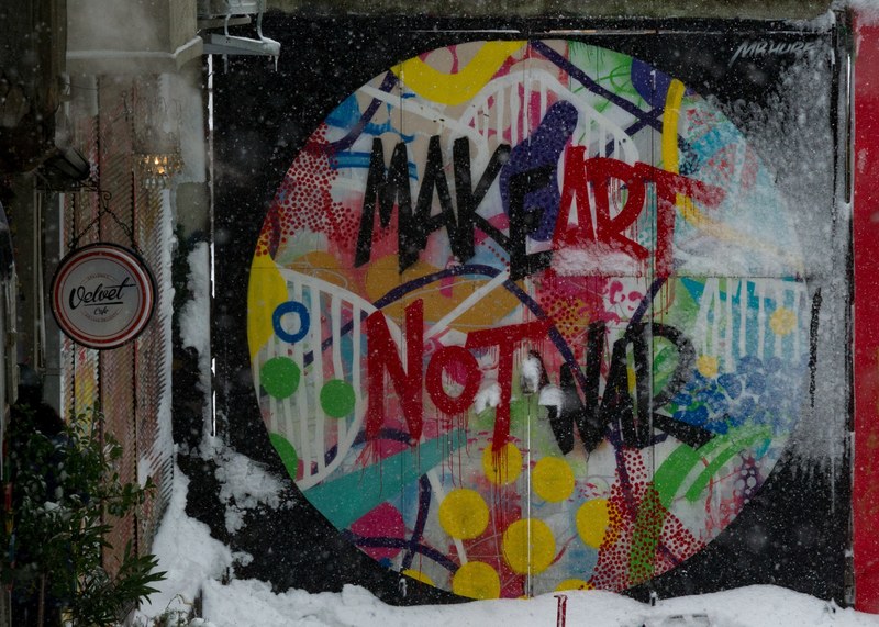 make art not war colorful graffiti message on urban wall in istanbul, make art not war mural 4k