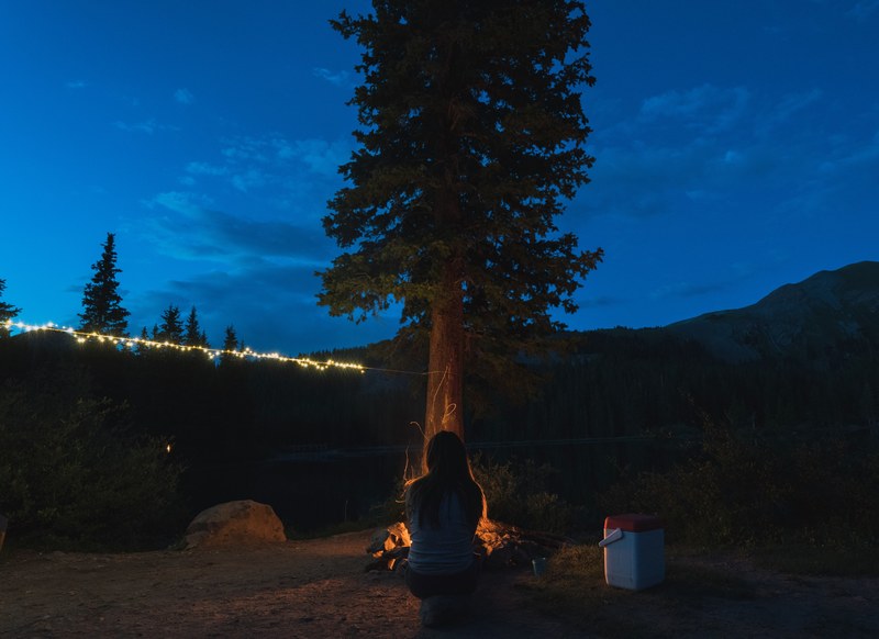 camping fairy light camp and lake 4k