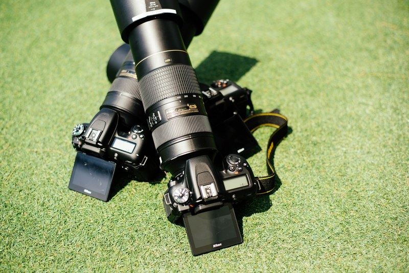 nikon camera lens and turf 4k