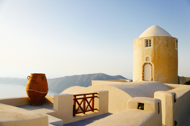 a stone building with a dome in santorini, santorini buildings 4k