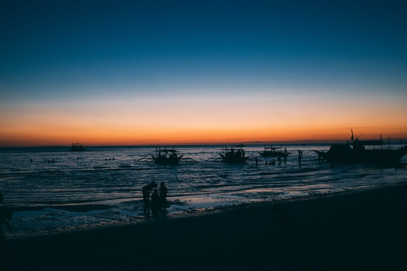 fishing boats near the coast of boracay after the sunset, fishing boats after sunset 4k