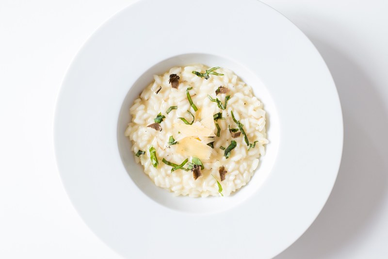 bowl of risotto with rice cheese and herbs for dinner, risotto bowl 4k