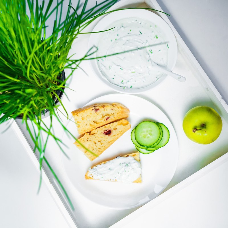 overhead shot of apples cucumbers dill dip and toast for snack, fresh healthy snack 4k