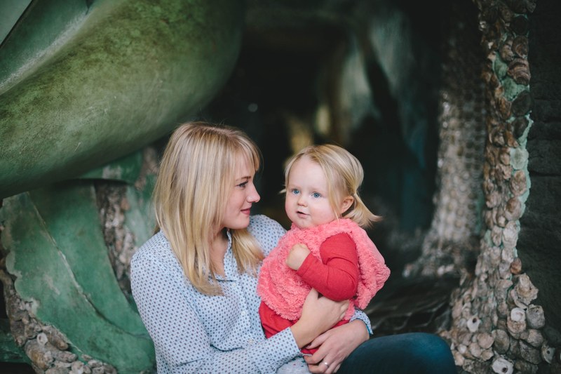 blonde woman and infant child share a tender moment in a lavish space, blonde mother and child 4k