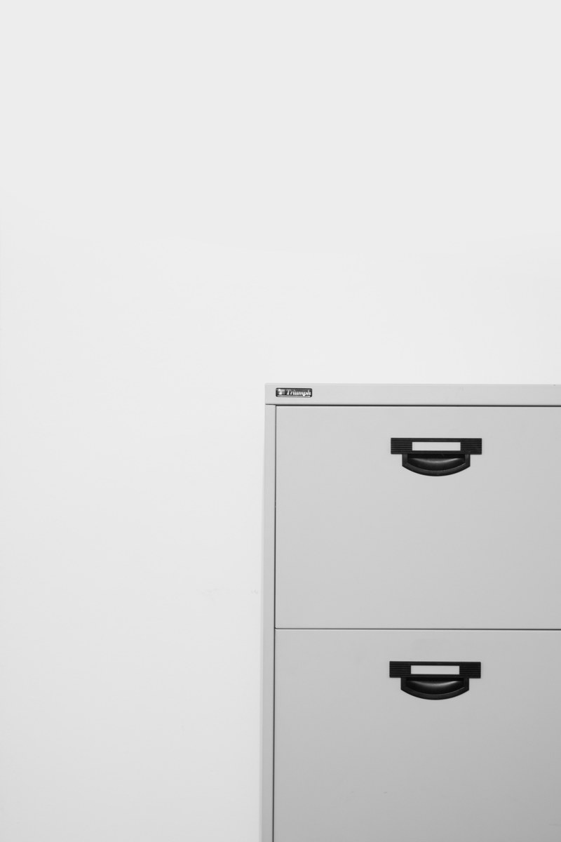a white filing cabinet in front of a white wall, _white filing cabinet 4k